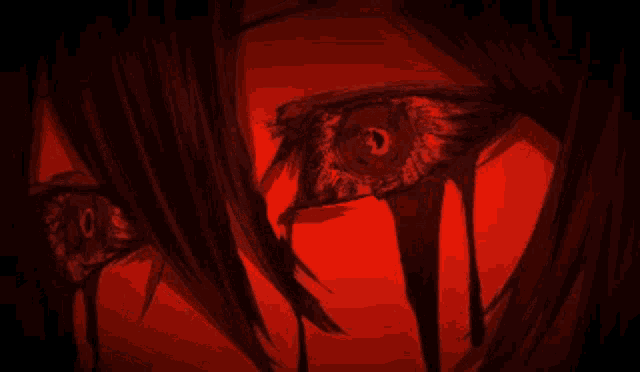 a close up of a person 's eye with blood coming out