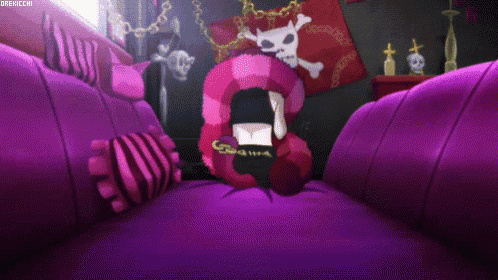 a girl is laying on a purple couch with a skull and crossbones poster on the wall