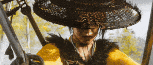 a woman wearing a hat and holding a sword in her hand