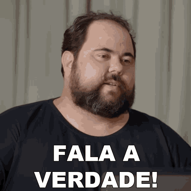 a man with a beard is wearing a black shirt with the words fala a verdade written on it