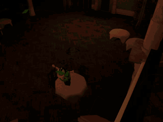 an aerial view of a dark room with tables and chairs and a box that says ' a ' on it
