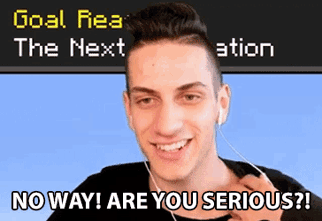 a man wearing ear buds is smiling in front of a screen that says goal rea the next action