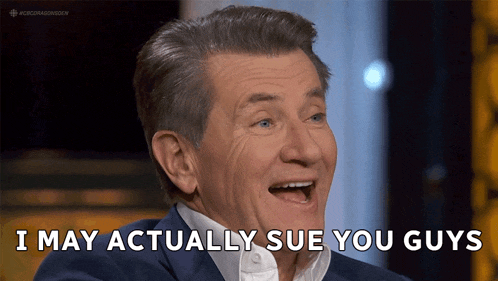 a man in a suit and white shirt says i may actually sue you guys