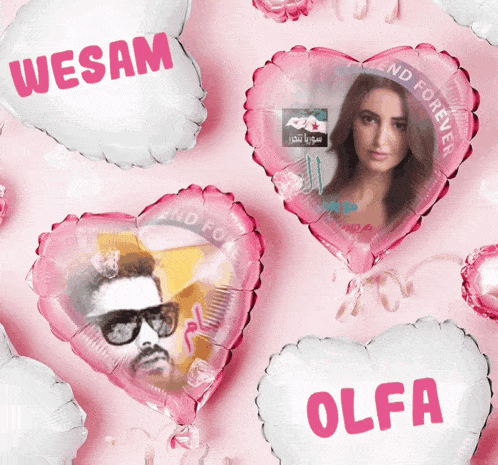 a pink heart shaped balloon with wesam written on it