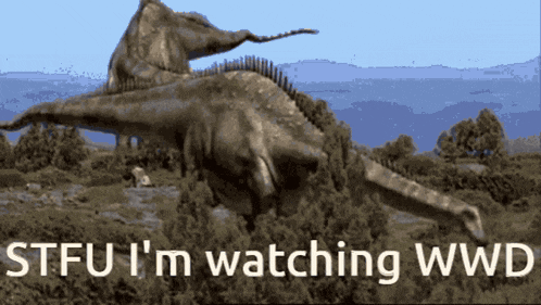 a picture of a dinosaur with the words stfu i 'm watching wwd above it
