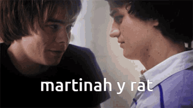 two young men are looking at each other with the words martinah y rat written on the bottom