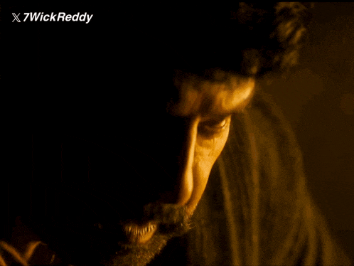 a close up of a man 's face with x7wick reddy written on the bottom