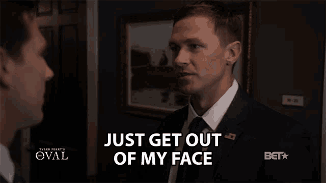 a man says just get out of my face in front of a bet logo