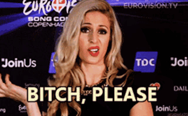a woman is standing in front of a sign that says eurovision tv