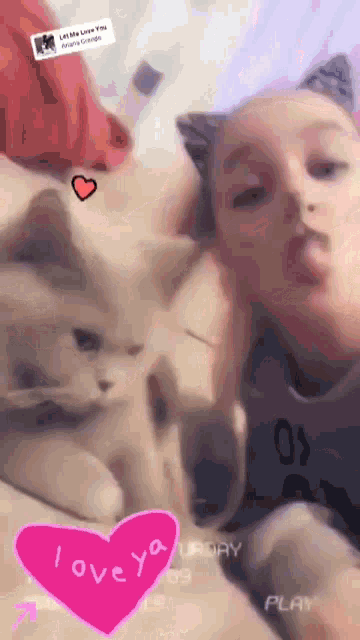 a girl with a cat and a heart that says loveya