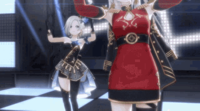 a woman in a red dress is standing next to another woman
