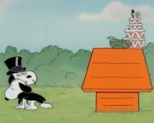 snoopy and woodstock shake hands in front of a doghouse