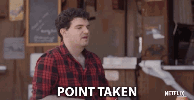 a man in a plaid shirt says point taken in a netflix ad