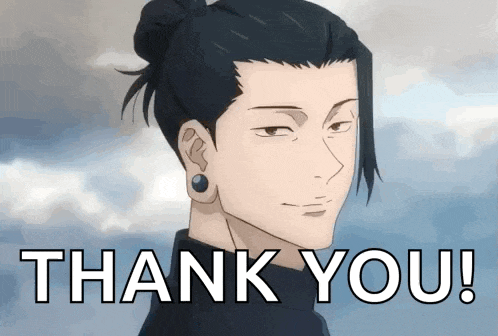 a man with a bun on his head is smiling and says thank you