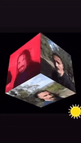 a 3d cube with a picture of a man and a sun on the side