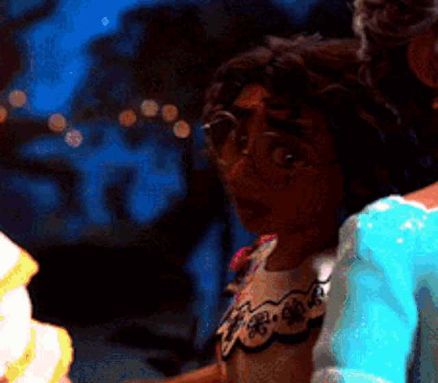 a doll with glasses and a blue dress is looking at something