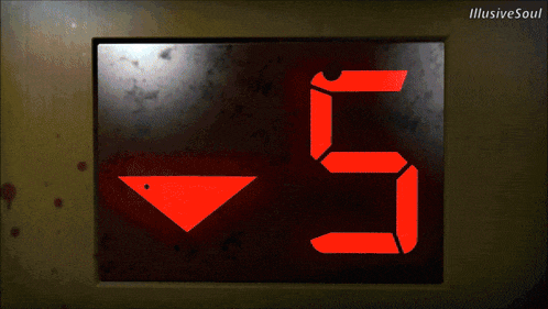 the number 5 is displayed in red on a black background