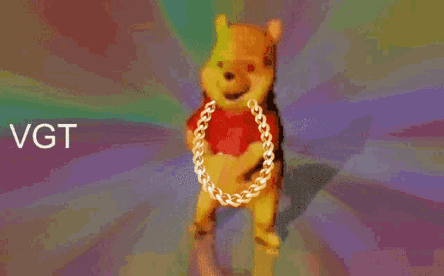 winnie the pooh is wearing a chain around his neck and says vgt