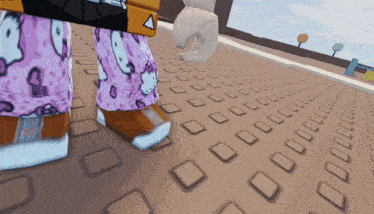 a person wearing hello kitty pajamas is walking