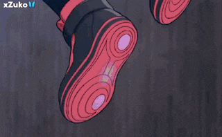 a person 's feet are glowing in the dark with a logo for xzuko in the corner
