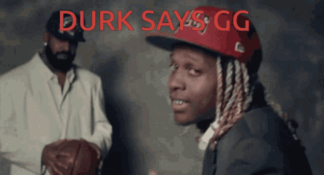 a man wearing a red hat with the word durk says gg on it