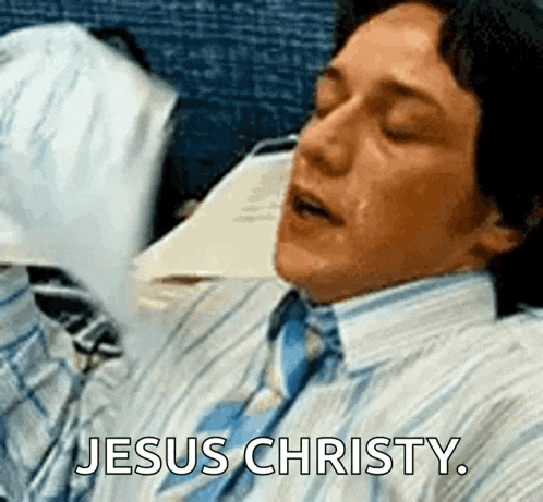 a man in a shirt and tie is saying jesus christy while sleeping