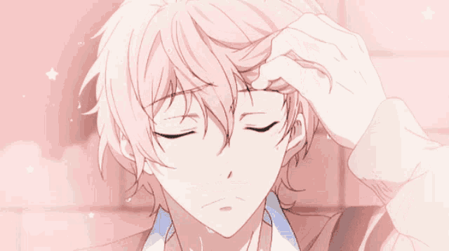 a boy with pink hair and blue eyes is smiling with his eyes closed