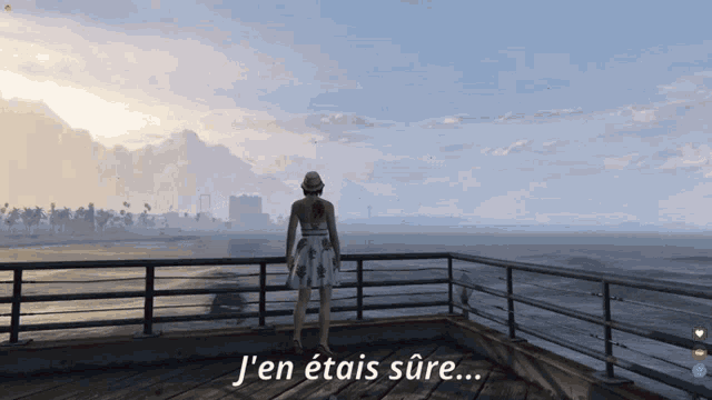 a woman standing on a balcony with the words j 'en etais sure written below her