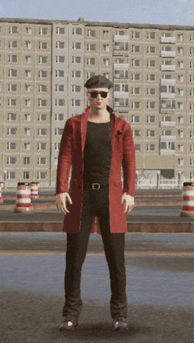 a man in a red coat and black pants is standing in front of a building