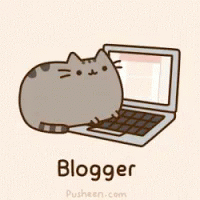 scaricare gif gratis: gatto che digita sulla tastiera come un blogger