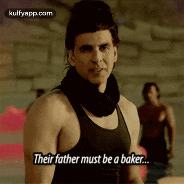 a man in a black tank top is saying their father must be a baker