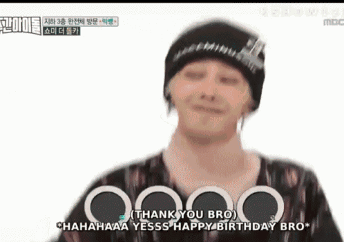 a man wearing a beanie is making a funny face and saying `` thank you bro `` .