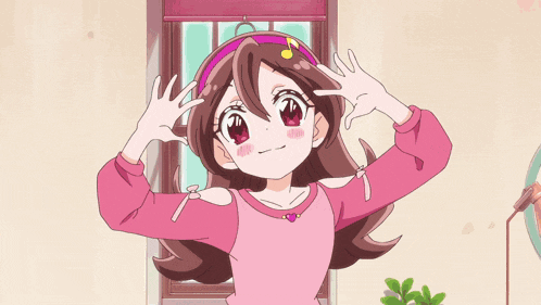 a girl in a pink shirt and blue skirt with a heart on her belt