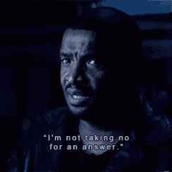a man in a dark room is saying " i 'm not taking no for an answer "