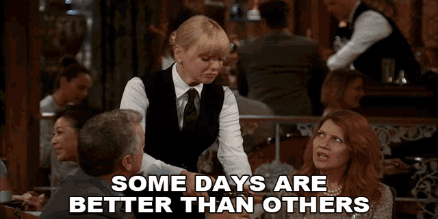 a waitress is serving a man and a woman in a restaurant and says " some days are better than others "