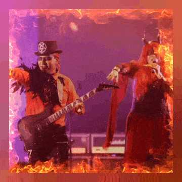 a man in a top hat with a pentagram on it plays a guitar