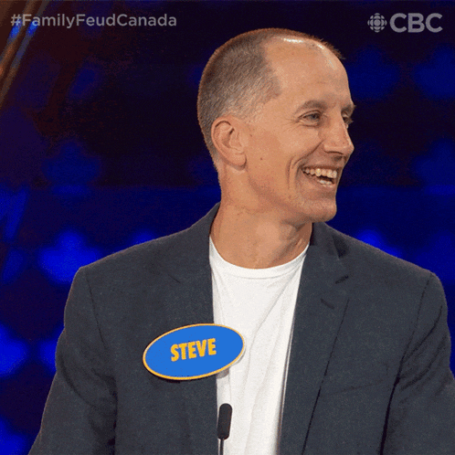 a man with a name tag that says steve is smiling