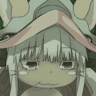 a close up of a cartoon character wearing a hat with a bird 's beak .