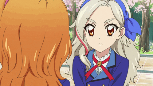 a girl with white hair is wearing a blue jacket with a red ribbon around her neck