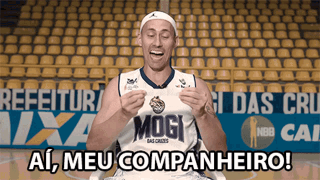 a man wearing a mogi das cruzes jersey is smiling