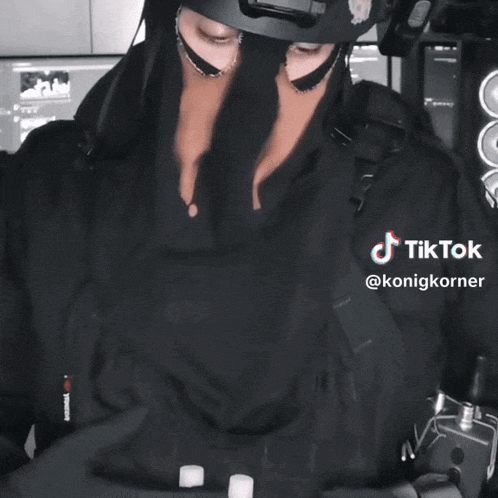 a blurred image of a person holding a steering wheel with the words tiktok @konigkorner on the bottom