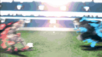 a blurry picture of two soccer players playing soccer on a field
