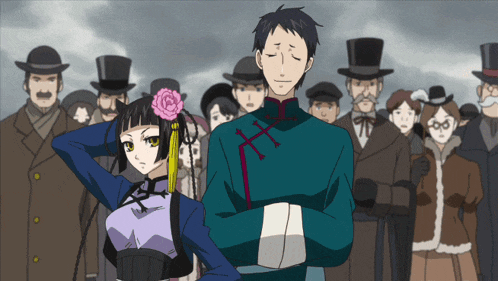 a man in a top hat stands next to a woman with a pink flower in her hair