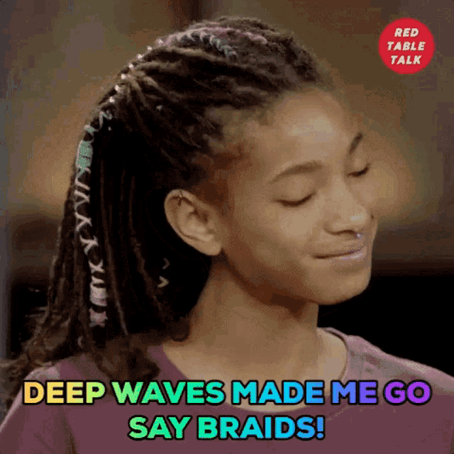 a girl with dreadlocks is smiling and saying deep waves made me go say braids