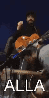 a man playing a violin and a man playing a guitar with the word facc on the bottom right