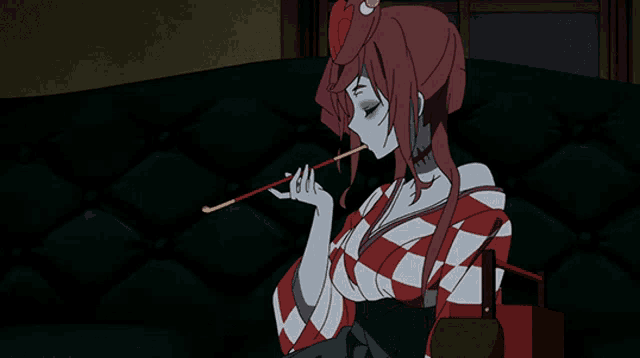 a woman in a kimono is smoking a cigarette