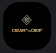 a close up of a black square with a gold logo on it