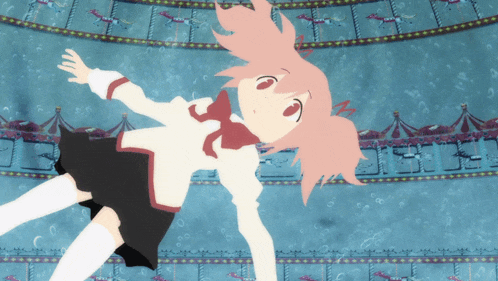a girl with pink hair is floating in the water