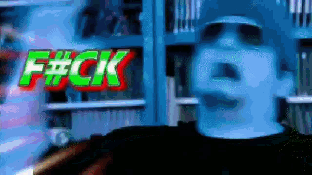 a blurry picture of a person with the word f # ck on the bottom