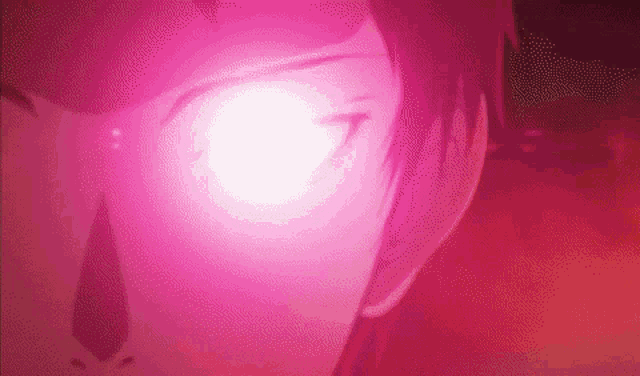a close up of a person 's face with a bright pink light coming out of it .